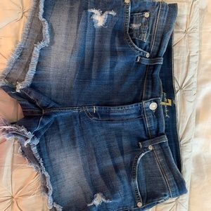 7 for all Mankind distressed denim cutoffs